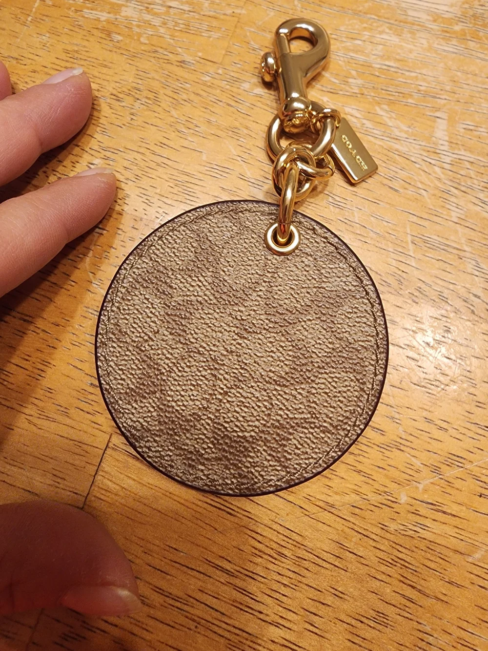 Coach Mirror Bag Charm in Signature Canvas the brand's iconic coated canvas
